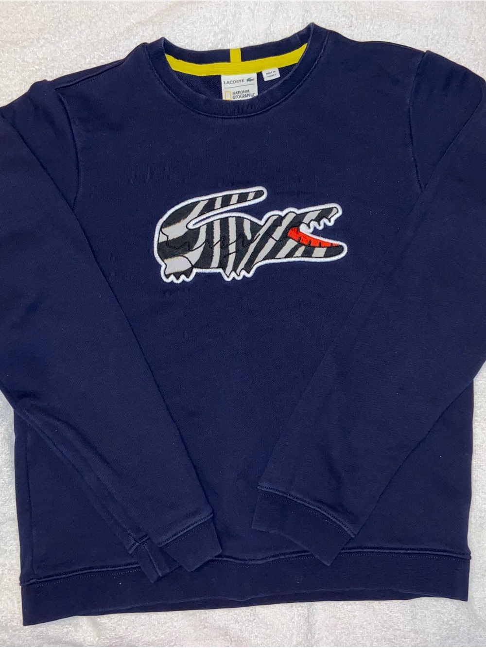 Lacoste Navy Crewneck Sweatshirt with Zebra Croc Patch and Red Accent